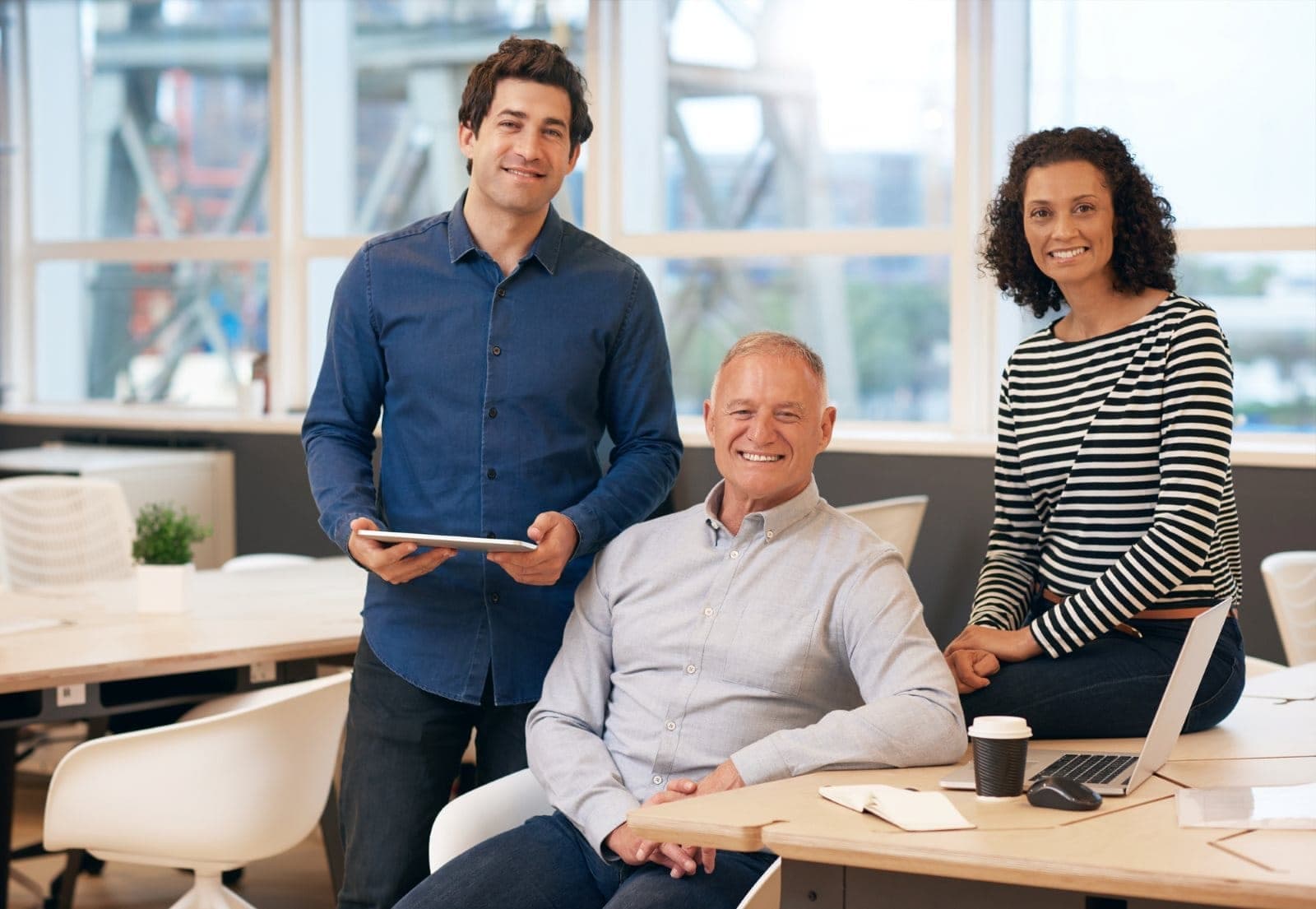 A confident business team in a modern office