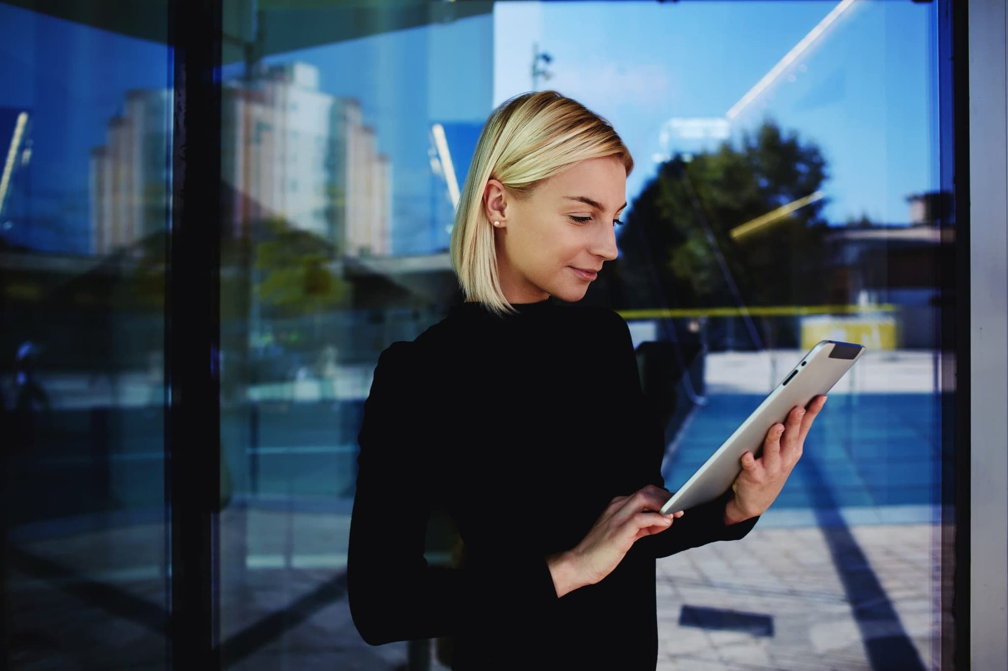 A business owner reviewing insights on a tablet